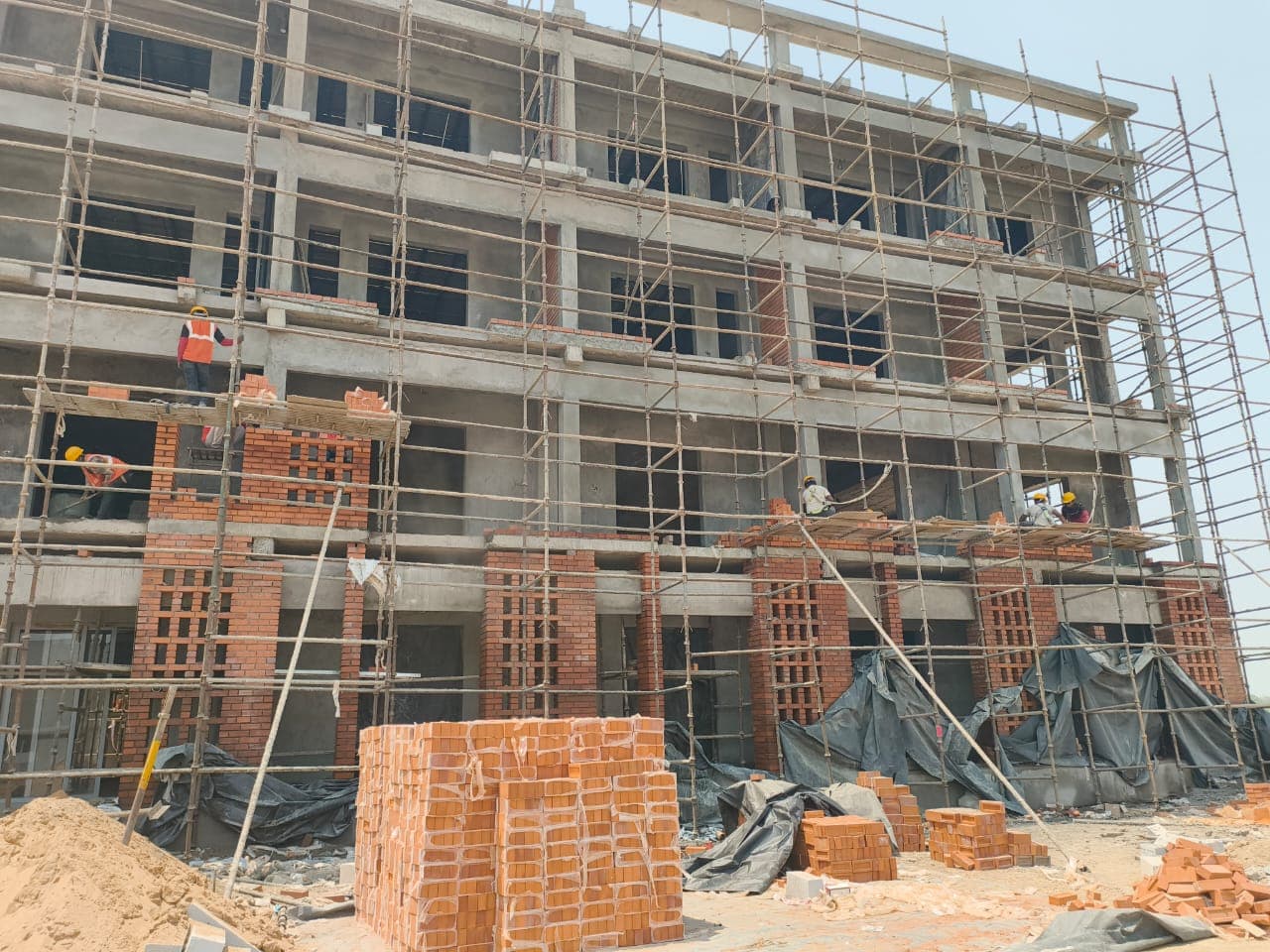 Material Staging & Wide Facade Perspective